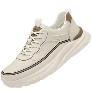 Men's lightweight dad sneakers in cream white with brown accents and thick sport sole