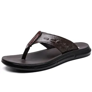 Men's dark brown leather flip flops with crocodile pattern and ergonomic sole