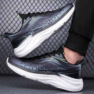 Scarpe da corsa uomo in mesh grigio-blu sfumato con suole bianche spesse e dettagli ciano