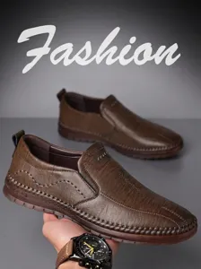 Detail shot of brown leather slip-on shoe with hand-stitched seams and textured finish