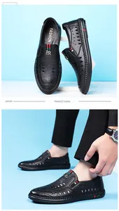 Nahaufnahme schwarzer atmungsaktiver Leder-Slipper mit rot-grünen Streifen-Details