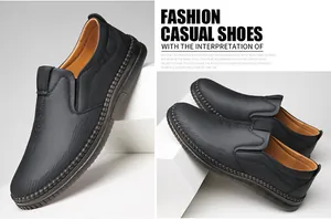 Detail view of black slip-on leather shoes with elastic side gore and rubber sole