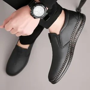 Men's casual black leather loafers with slip-on design and anti-slip rubber soles