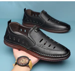 Detail of hand-sewn stitching and breathable hollow design on black leather sandals