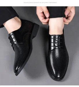 Detailed macro view of laser-cut perforated breathable texture on black leather oxfords