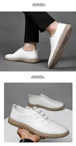 Detail of white men's slip-on shoes featuring a non-slip rubber sole and fine stitching