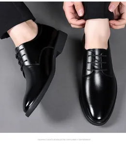 Polished black leather Derby shoe showing classic lace-up detail on a gray background