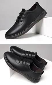 Detail of men's black slip-on leather shoes with elastic sides and anti-slip rubber soles