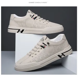 Détail de la chaussure beige ajourée avec logo H distinctif sur la semelle