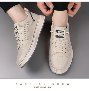Close-up of men beige casual shoes featuring hollow breathable punch holes on the side