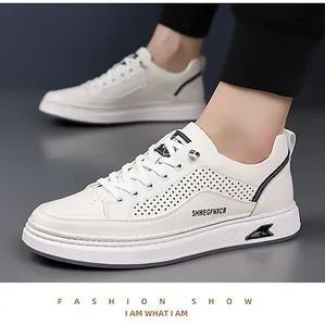 Close-up of white summer casual sneakers featuring breathable perforated sides and thick soles