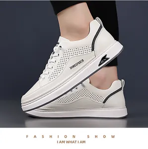 Close-up of off-white breathable men sneakers with laser-cut side vents and black logo