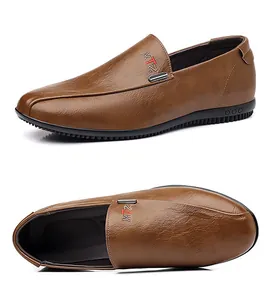 Detail of brown leather loafer featuring anti-slip rubber sole and metallic side trim