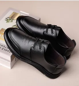 Macro shot of black leather texture and non-slip thick sole on men business shoes