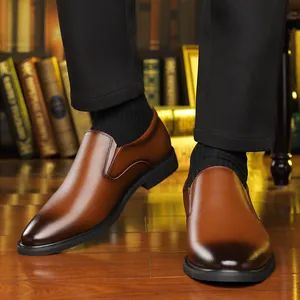 Men's brown slip-on formal loafers with burnished toe detail and low heel design