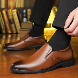 Classic men's brown leather dress shoes with gradient toe and slip-on design