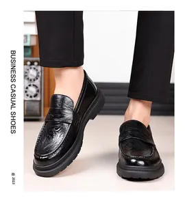 Detail of classic black leather loafers with non-slip rubber sole and polished texture