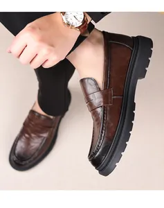 Macro detail of brown leather loafers with vintage finish and thick black rubber sole