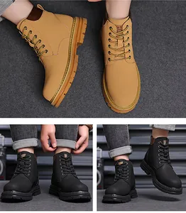 Detail of non-slip rubber soles and lace-up design on classic nubuck work boots