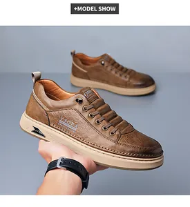 Detail showing brown leather texture and logo branding on men's casual thick sole sneakers