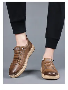 Close-up of brown leather men's casual shoes featuring retro texture and thick khaki soles