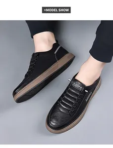Close-up of men's black leather casual shoes with brown soles and lace-up design