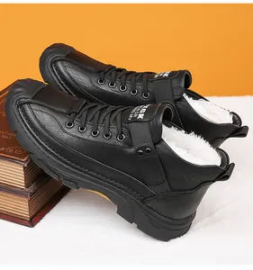 Detailed macro view of black winter boots featuring warm white faux fur lining and sturdy laces