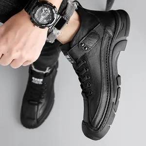 Men's black mid-top hiking boots with premium leather texture and non-slip rubber sole