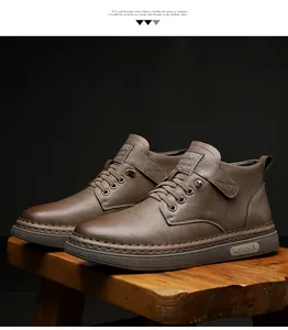 Detailed macro view of the vintage brown leather boot showing stitching and fashion texture