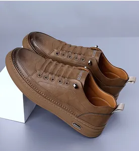 Detail shot of brown leather men's shoe with textured upper and gradient vintage toe