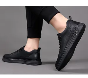 Close-up of black casual leather shoes with litchi texture and thick rubber soles