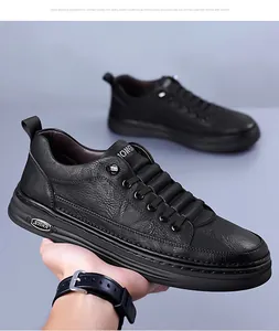 Close-up of black litchi pattern leather texture and thick rubber sole on men's casual shoe