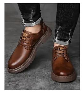 Detail of brown litchi texture leather shoes with anti-slip thick rubber sole
