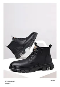 Detail of black leather men's boots featuring thick anti-slip soles and metal ID accent