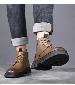 Close-up of vintage brown leather Martin boots with non-slip thick rubber soles