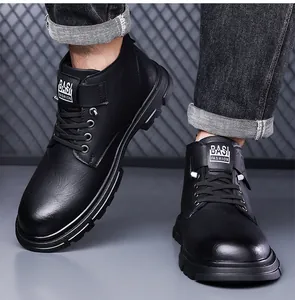 Detail of waterproof black leather winter boots featuring durable metal eyelets and thick rubber soles