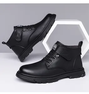 Detail view of black high-top winter boots with durable rubber sole and lace-up closure