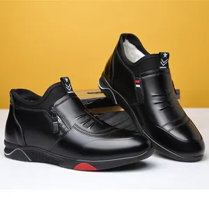 Detailed close-up of men's winter leather boots featuring side zipper and warm fleece lining