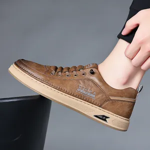 Brown leather casual loafers for men featuring thick beige soles and stylish stitching