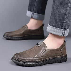 Classic dark brown slip-on leather shoes for men featuring a non-slip thick rubber sole