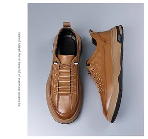 Close-up of brown leather shoes with embossed checkered details and thick contrast sole