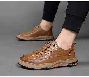 Close-up of brown leather casual shoe with textured square embossing and thick sole