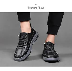 Detail view of black waterproof leather upper with double stitching and metal lace buckle