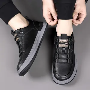 Men's premium black leather casual sneakers with thick grey soles and lace-up design