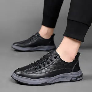 Men's retro black leather sneakers with grey thick soles and textured side details