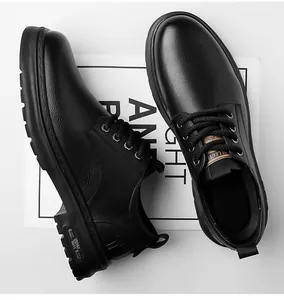 Close-up of matte black leather oxfords with COLLECTION 2030 gold text on the tongue