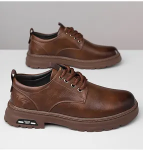 Detail of vintage brown leather men's derby shoes with retro color gradient and metal eyelets