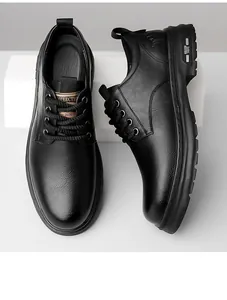 Close-up of black leather business casual shoes with textured finish and thick rubber sole