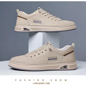 Vue détaillée des baskets beiges en cuir pour homme avec accents bleus et logo Y3OPA