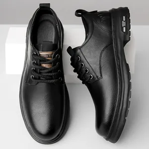Classic black men's business casual leather shoes with textured finish and thick rubber soles